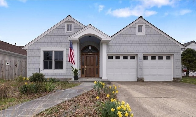 view of front of house with an attached garage and concrete driveway