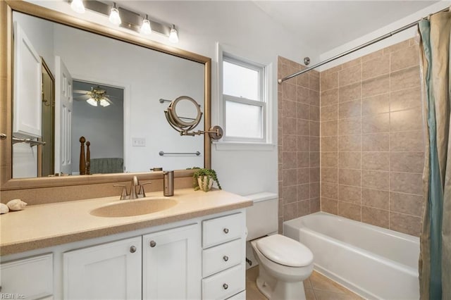 full bathroom with tile patterned floors, toilet, shower / tub combo, ceiling fan, and vanity