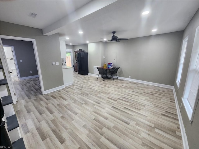 interior space featuring visible vents, recessed lighting, light wood-type flooring, and baseboards