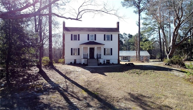 colonial home with a chimney