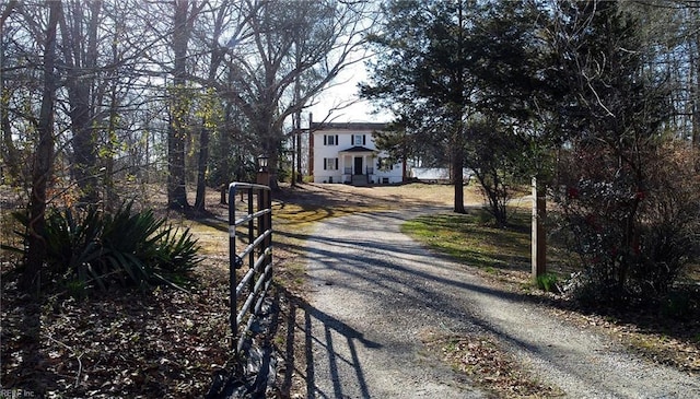 view of road with driveway