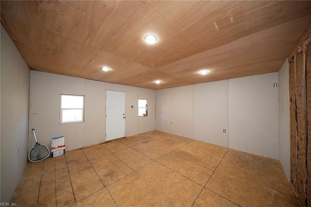 empty room with wooden ceiling