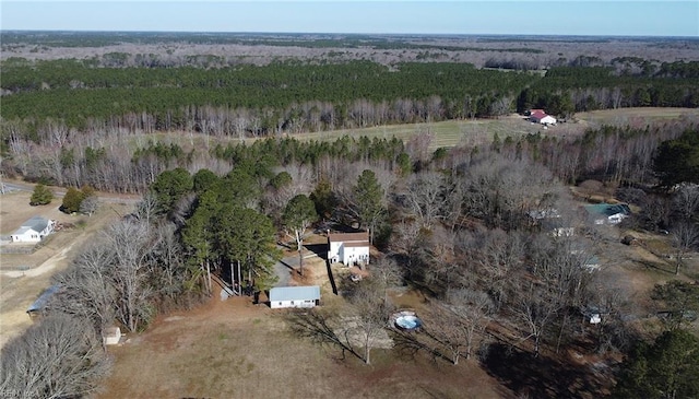 birds eye view of property with a rural view