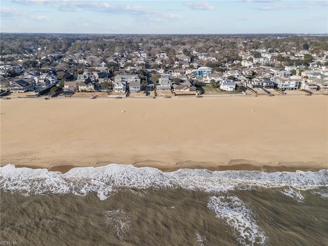 drone / aerial view with a residential view and a water view