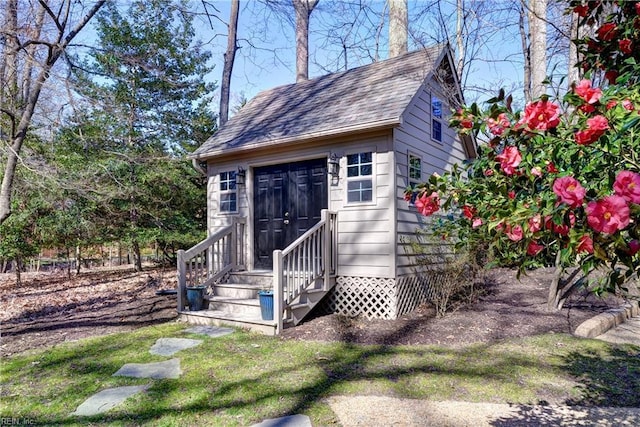 view of outbuilding with an outdoor structure and entry steps