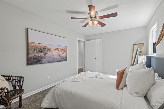 bedroom with carpet, baseboards, and ceiling fan