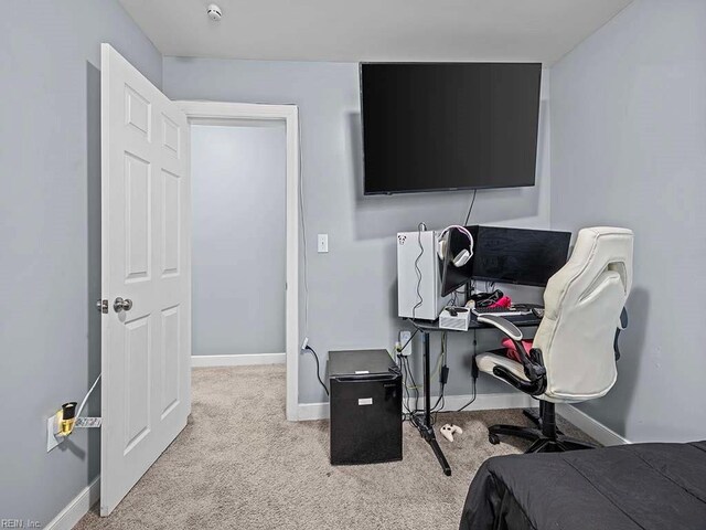 bedroom featuring carpet flooring and baseboards