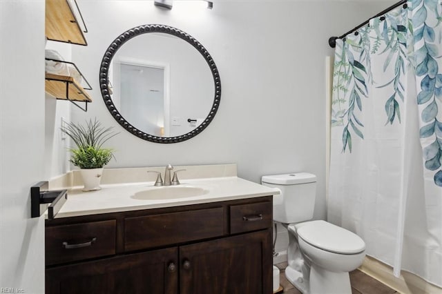 full bath with a shower with shower curtain, toilet, and vanity