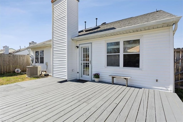 wooden deck with central AC and fence