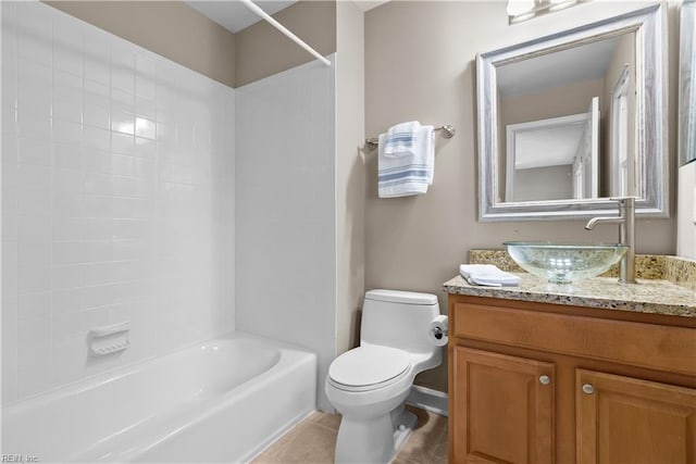 bathroom with tile patterned floors, shower / bath combination, toilet, and vanity