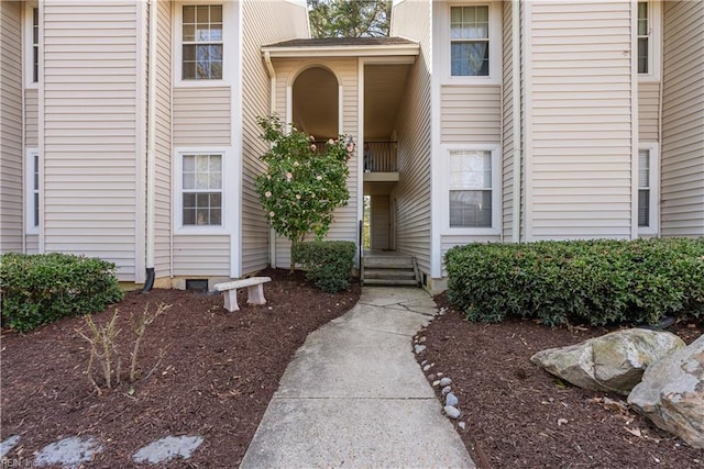 view of exterior entry featuring crawl space