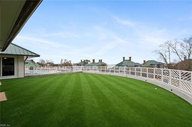 view of yard with fence