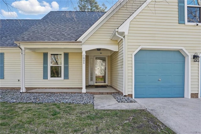 entrance to property with driveway, covered porch, and roof with shingles