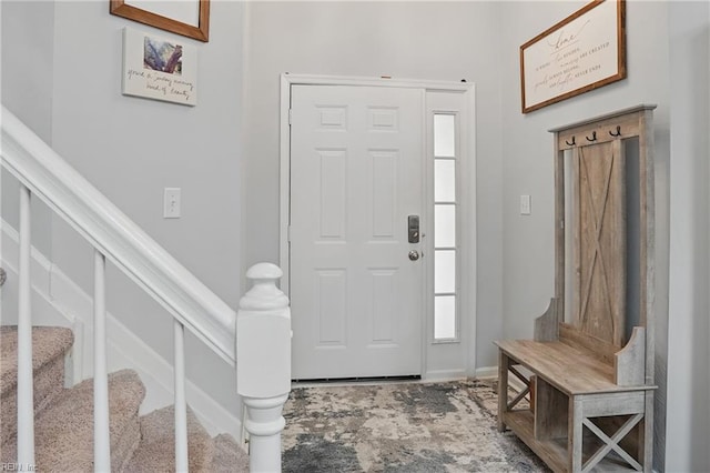 foyer entrance featuring stairs