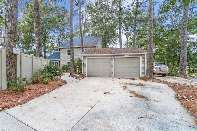 garage with fence