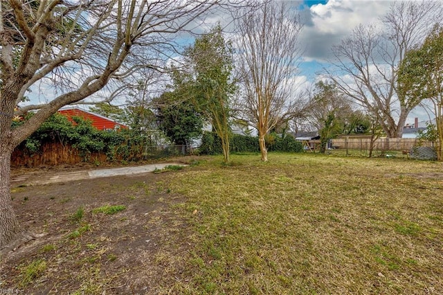 view of yard featuring fence