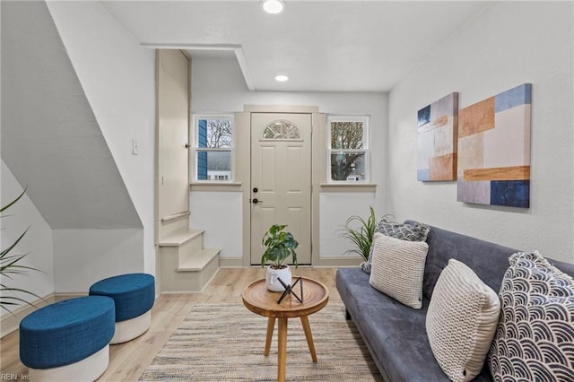 living room with stairway, recessed lighting, baseboards, and wood finished floors