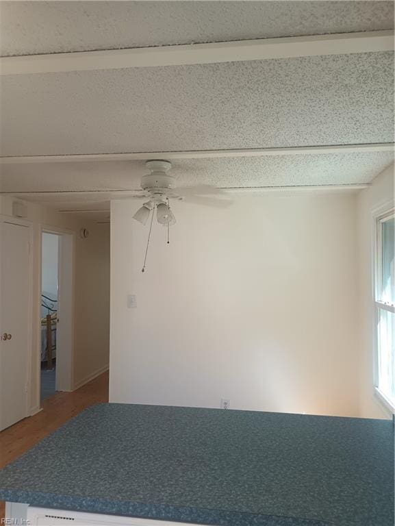 unfurnished room featuring ceiling fan