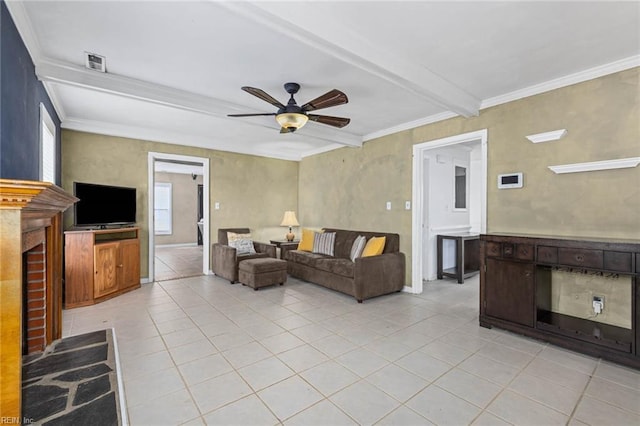 living area with visible vents, crown molding, beamed ceiling, light tile patterned floors, and a ceiling fan