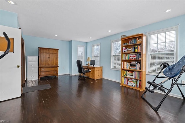 home office with recessed lighting, wood finished floors, and baseboards