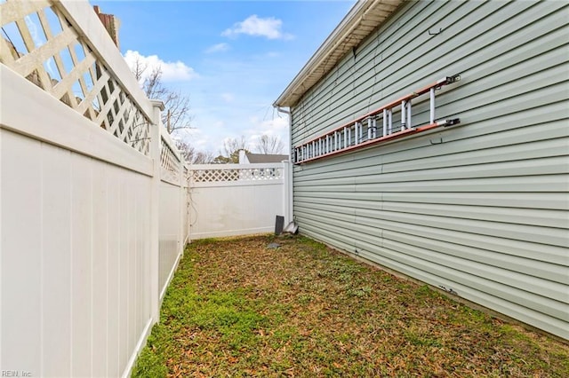 view of yard featuring fence