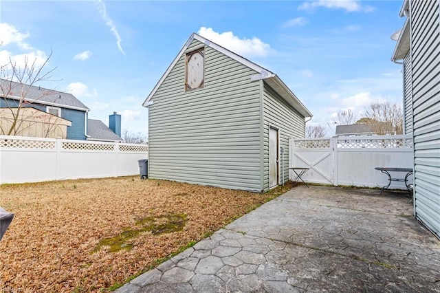 exterior space featuring a gate and fence