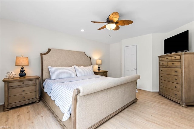 bedroom featuring light wood-style flooring, recessed lighting, baseboards, and ceiling fan