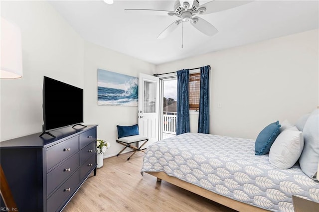 bedroom with access to exterior, a ceiling fan, and light wood-style floors