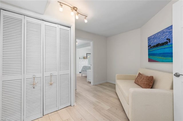 living area featuring light wood-style flooring