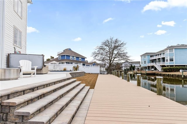 dock area featuring a water view