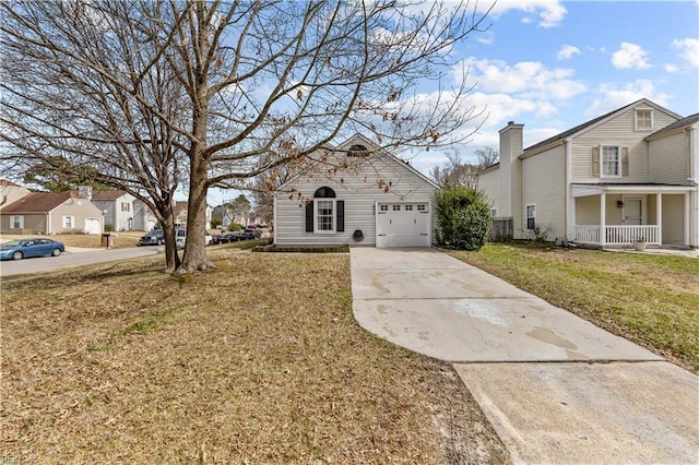 view of front of property featuring driveway, a porch, a residential view, an attached garage, and a front yard