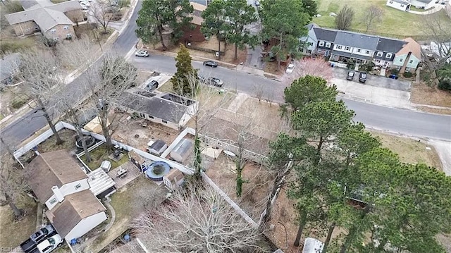 birds eye view of property with a residential view