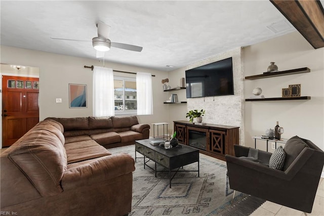 living area featuring ceiling fan