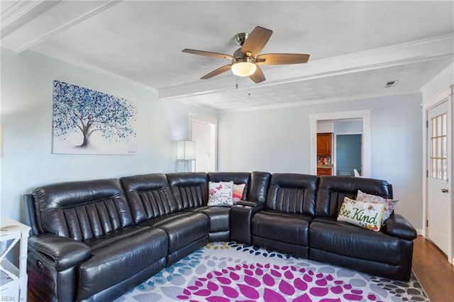 living area featuring beamed ceiling, wood finished floors, visible vents, and ceiling fan