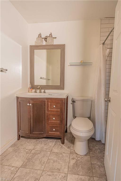 full bathroom featuring vanity and toilet