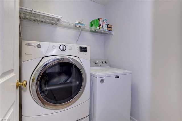 laundry area with laundry area and washing machine and dryer