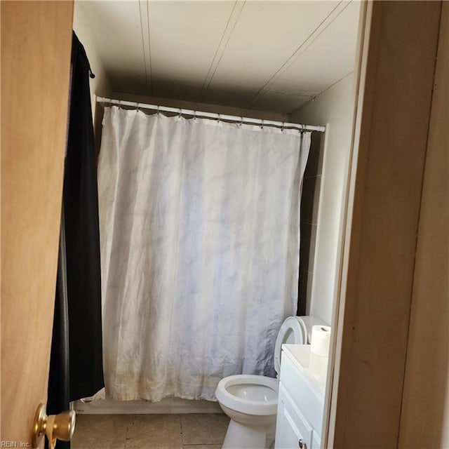 full bathroom with vanity, tile patterned floors, toilet, and a shower with curtain