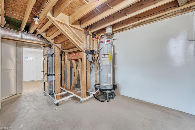 unfinished basement featuring electric water heater