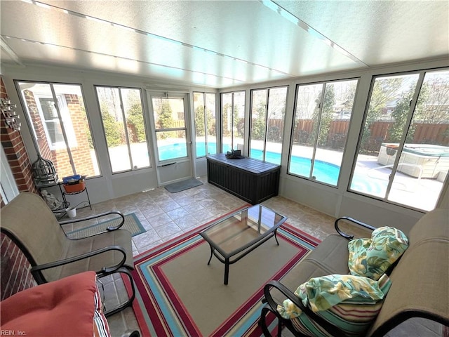 sunroom / solarium featuring a wealth of natural light