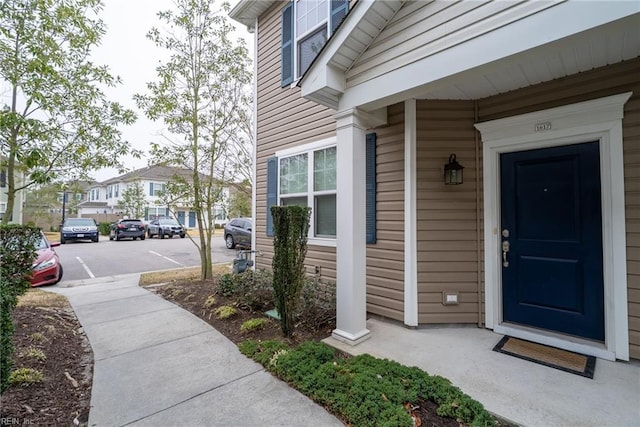 property entrance featuring a residential view