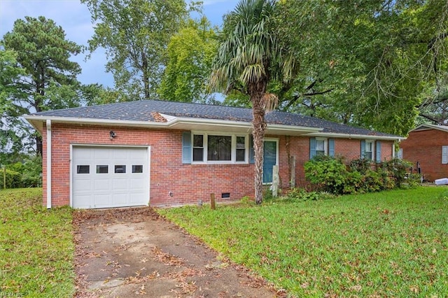 single story home featuring driveway, an attached garage, a front lawn, crawl space, and brick siding