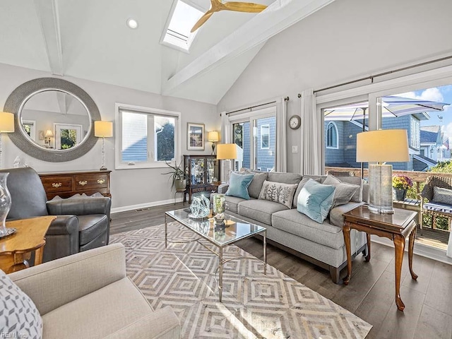 living room featuring baseboards, recessed lighting, a skylight, wood finished floors, and high vaulted ceiling