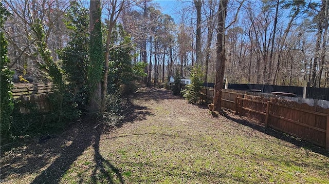 view of yard with fence