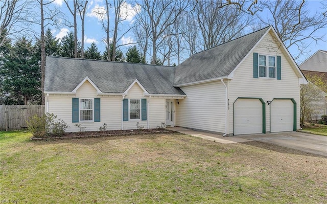 view of front of house with a shingled roof, fence, concrete driveway, a front yard, and an attached garage