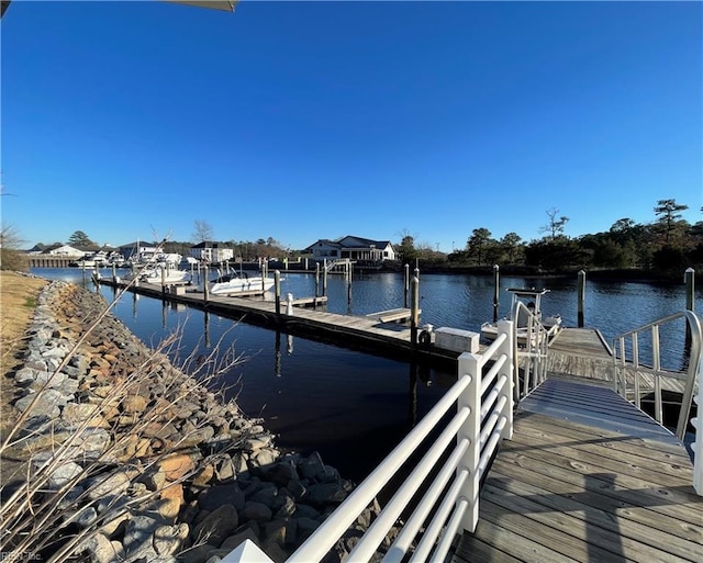 view of dock with a water view