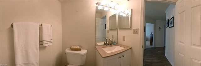 half bath with toilet and vanity