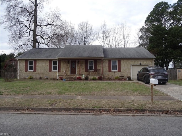 ranch-style house with brick siding, a front lawn, fence, a garage, and driveway