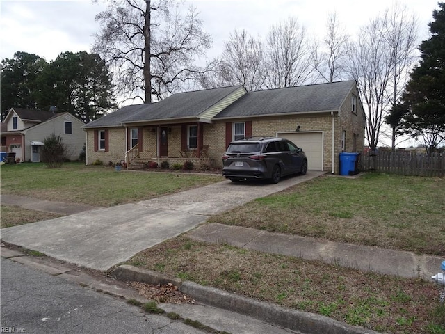 ranch-style house featuring a garage, brick siding, concrete driveway, and a front yard