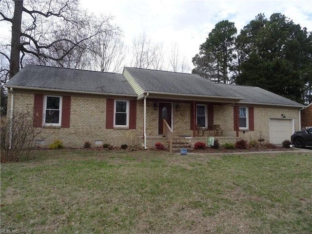 single story home featuring brick siding, an attached garage, a front yard, and roof with shingles