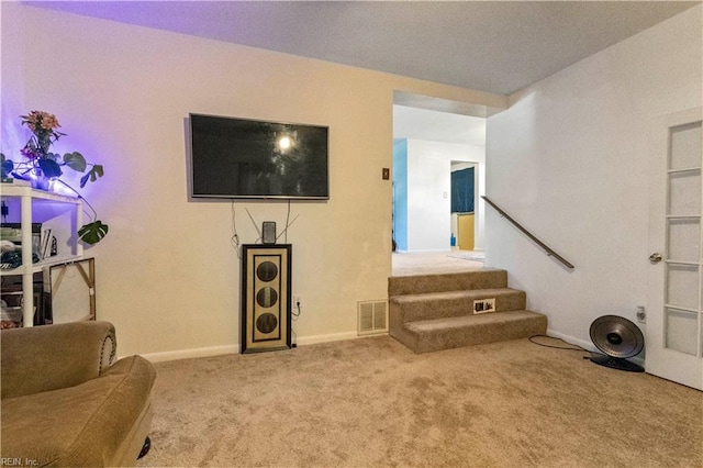 living area featuring stairs, baseboards, visible vents, and carpet floors